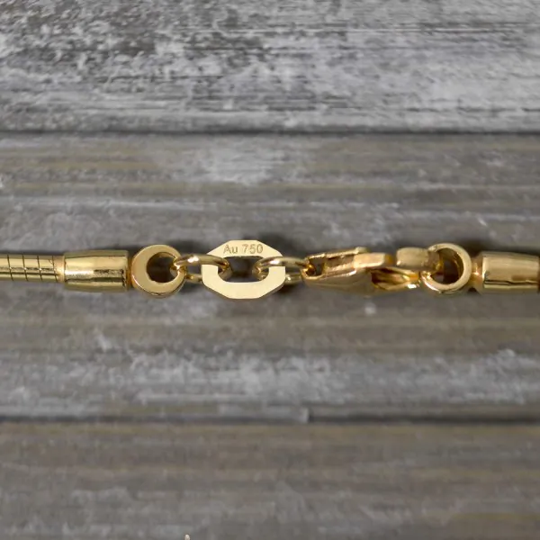 Goldkette als Tondakette in Gelbgold 750 / 18K, 50 cm lang, 1,5 mm breit, Gewicht ca. 12.7 g.