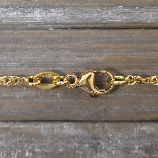 Goldkette als Singapurkette in Gelbgold 750 / 18K, 45 cm lang, 1.8 mm breit, Gewicht ca. 3.5 g.