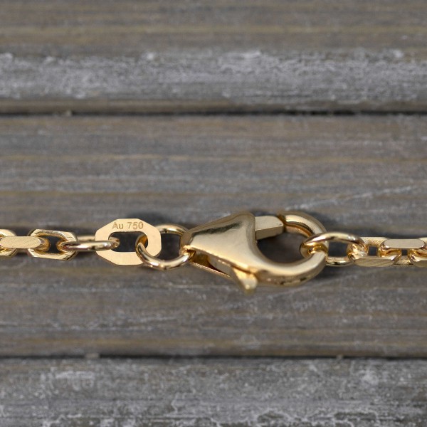 Armband als Ankerkette diamantiert in Gelbgold 750 / 18K, 21 cm lang, 2 mm breit, Gewicht ca. 6.2 g.