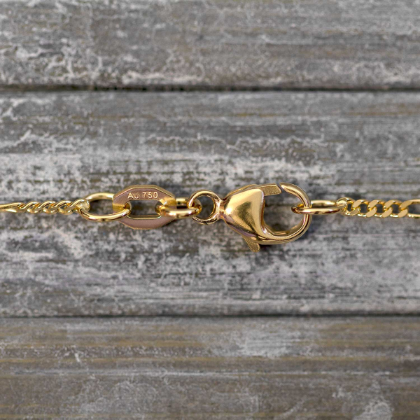 Goldkette als Figarokette diamantiert in Gelbgold 750 / 18K, 42 cm lang, 1,5 mm breit, Gewicht ca. 2.8 g.