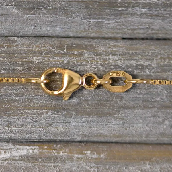 Goldkette als Venezianerkette in Gelbgold 750 / 18K, 34 cm lang, 0,7 mm breit, Gewicht ca. 1.8 g.