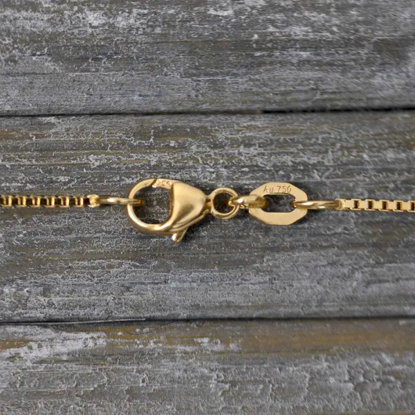 Goldkette als Venezianerkette in Gelbgold 750 / 18K, 38 cm lang, 0,9 mm breit, Gewicht ca. 3 g.