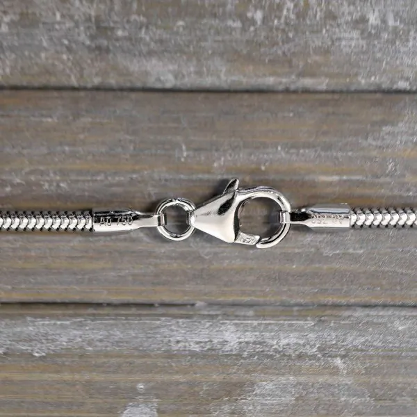Goldkette als Schlangenkette in Weißgold 750 / 18K, 70 cm lang, 1,6 mm breit, Gewicht ca. 10.6 g.