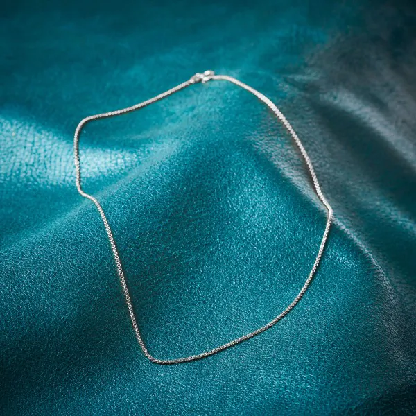 Goldkette als Erbskette in Weißgold 585 / 14K, 55 cm lang, 1,5 mm breit, Gewicht ca. 5.1 g.