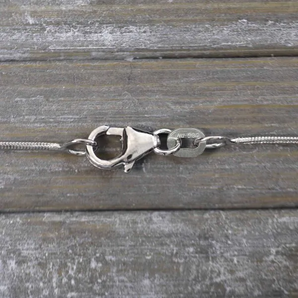 Goldkette als Schlangenkette in Weißgold 585 / 14K, 55 cm lang, 0,9 mm breit, Gewicht ca. 5.3 g.