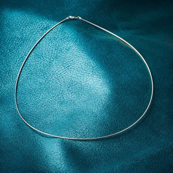 Goldkette als Tondakette in Weißgold 333 / 8K, 65 cm lang, 1,2 mm breit, Gewicht ca. 7.2 g.