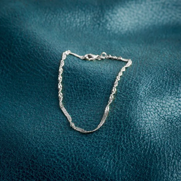 Armband als Singapurkette in Weißgold 585 / 14 K, 21,5 cm lang, 2,2mm breit, Gewicht ca. 2.3 g.