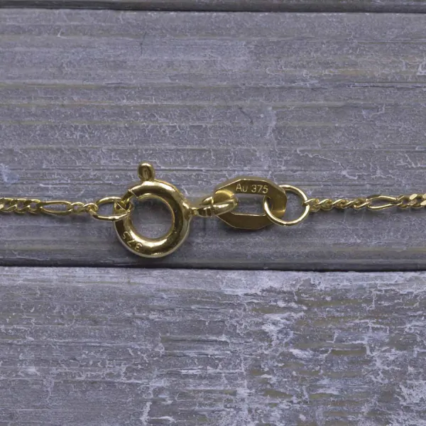 Goldkette als Figarokette diamantiert in Gelbgold 375 / 9K, 34 cm lang, 1,1 mm breit, Gewicht ca. 1 g.