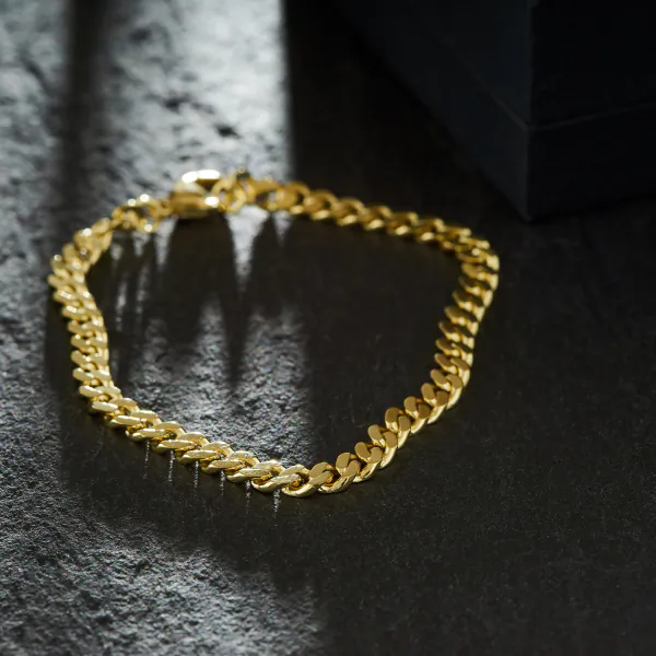 Armband als Panzerkette flach in Gelbgold 333 / 8K, 18,7 cm lang, 4,7 mm breit, Gewicht ca. 9.6 g.