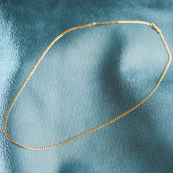 Goldkette als Panzerkette weit in Gelbgold 375 / 9 Karat, 100 cm lang, 2.6 mm breit, Gewicht ca. 6.5 g.