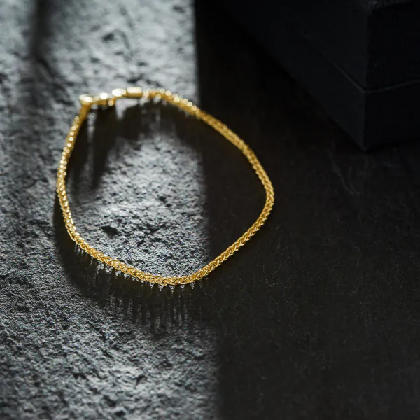Armband als Zopfkette in Gelbgold 333 / 8 K, 18 cm lang, 1,7mm breit, Gewicht ca. 1.8 g.