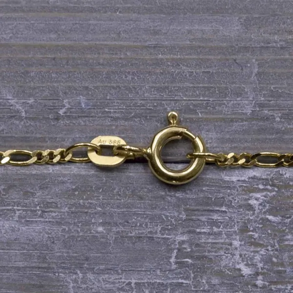 Goldkette als Figarokette diamantiert in Gelbgold 585 / 14K, 60 cm lang, 1,5 mm breit, Gewicht ca. 3.2 g.