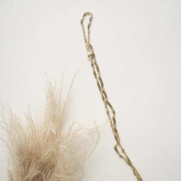Goldkette als Singapurkette in Gelbgold 750 / 18 Karat, 80 cm lang, 2.4 mm breit, Gewicht ca. 9 g.