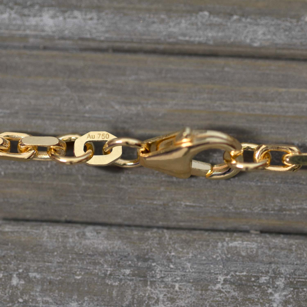 Goldkette als Ankerkette diamantiert in Gelbgold 750 / 18K, 65 cm lang, 2,5 mm breit, Gewicht ca. 25.4 g.