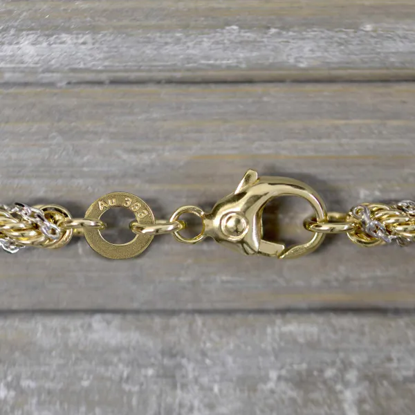 Goldkette als Kordelkette hohl in Bicolor Gelbgold / Weißgold 333 / 8K, 60 cm lang, 3,3 mm breit, Gewicht ca. 13.6 g.