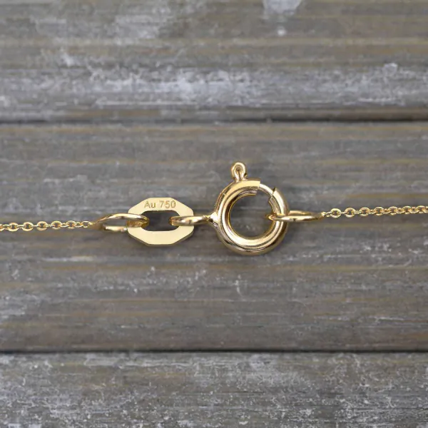 Goldkette als Ankerkette flach in Gelbgold 750 / 18K, 42 cm lang, 0,8 mm breit, Gewicht ca. 1.1 g.