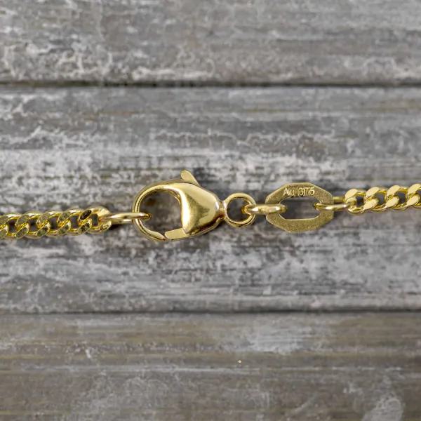 Goldkette als Panzerkette flach in Gelbgold 375 / 9K, 55 cm lang, 2,1 mm breit, Gewicht ca. 6.8 g.