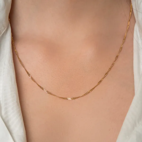 Goldkette als Singapurkette in Gelbgold 375 / 9 Karat, 95 cm lang, 1.8 mm breit, Gewicht ca. 5.2 g.
