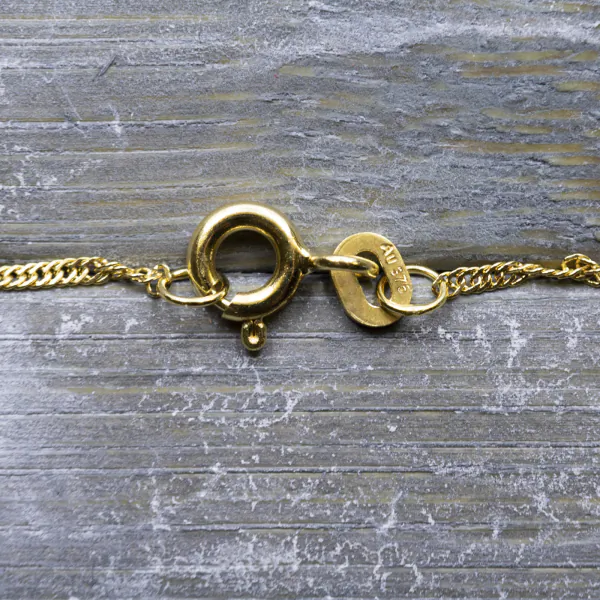 Goldkette als Singapurkette in Gelbgold 375 / 9 Karat, 75 cm lang, 1.2 mm breit, Gewicht ca. 2.1 g.