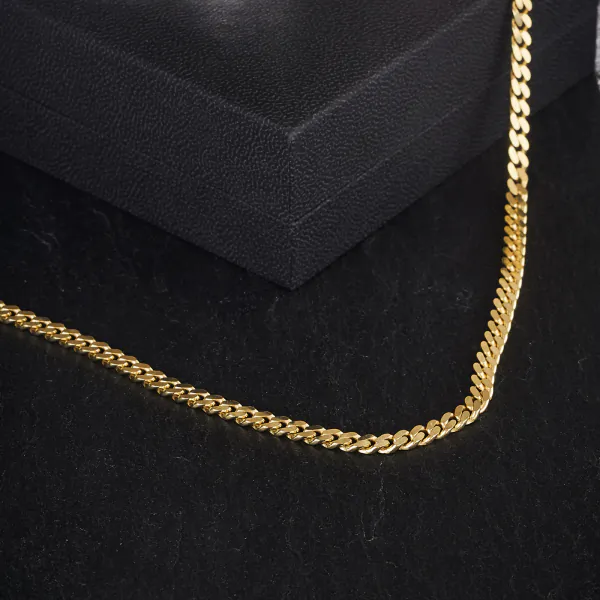 Armband als Panzerkette flach in Gelbgold 585 / 14K, 14 cm lang, 4,1 mm breit, Gewicht ca. 6 g.