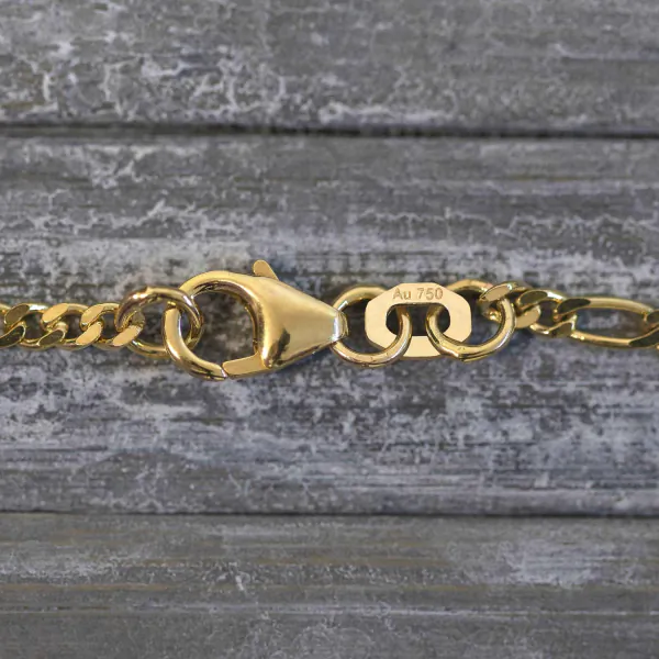 Goldkette als Figarokette diamantiert in Gelbgold 750 / 18K, 45 cm lang, 2.2 mm breit, Gewicht ca. 6.3 g.