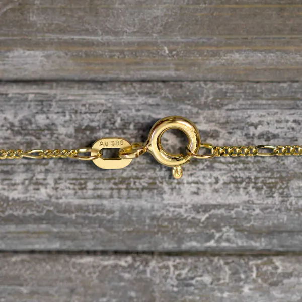 Goldkette als Figarokette diamantiert in Gelbgold 585 / 14K, 45 cm lang, 1,1 mm breit, Gewicht ca. 1.5 g.