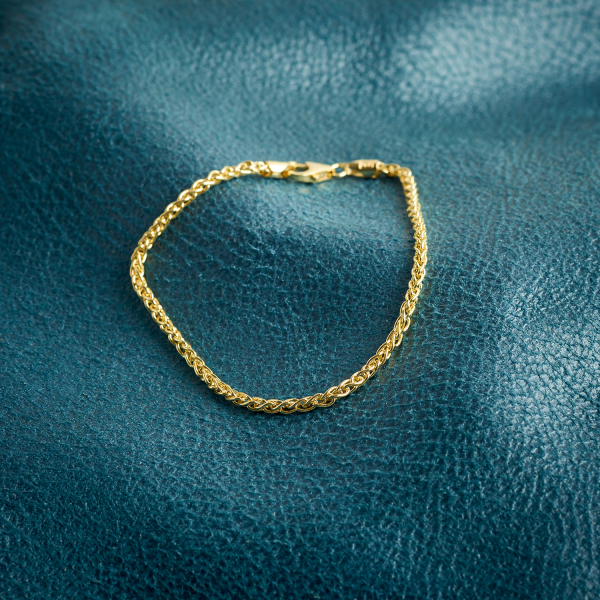 Armband als Zopfkette in Gelbgold 585 / 14 K, 20 cm lang, 2,5mm breit, Gewicht ca. 5 g.