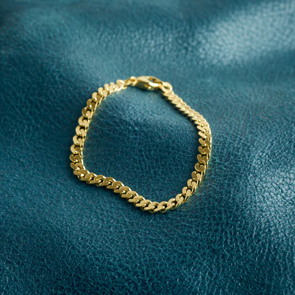 Armband als Panzerkette flach in Gelbgold 333 / 8K, 18,7 cm lang, 4,7 mm breit, Gewicht ca. 9.6 g.