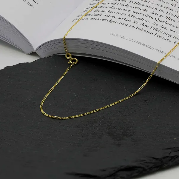 Goldkette als Figarokette diamantiert in Gelbgold 585 / 14K, 60 cm lang, 1,5 mm breit, Gewicht ca. 3.2 g.