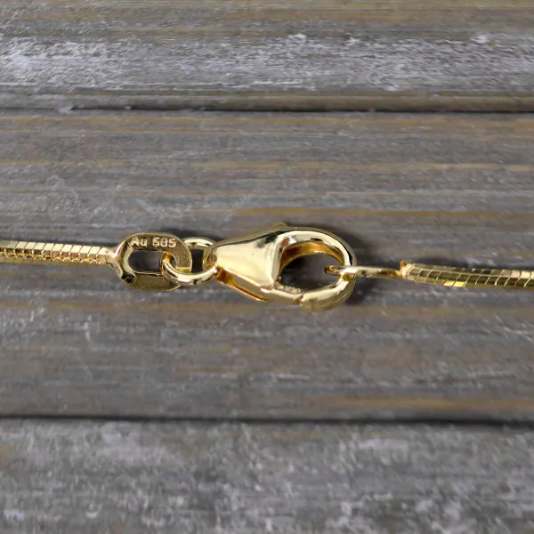 Goldkette als Schlangenkette diamantiert in Gelbgold 585 / 14K, 50 cm lang, 1 mm breit, Gewicht ca. 5.9 g.