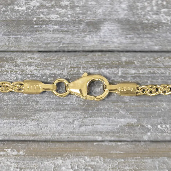 Armband als Zopfkette in Gelbgold 375 / 9 K, 21,5 cm lang, 2,5mm breit, Gewicht ca. 4.8 g.