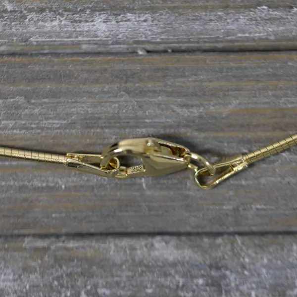Goldkette als Tondakette in Gelbgold 333 / 8K, 42 cm lang, 1 mm breit, Gewicht ca. 3 g.