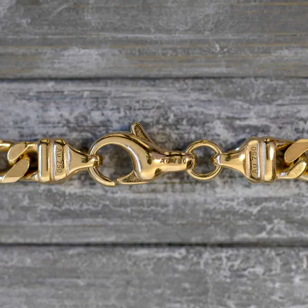 Goldkette als Figarokette diamantiert in Gelbgold 750 / 18K, 65 cm lang, 4,3 mm breit, Gewicht ca. 33.9 g.