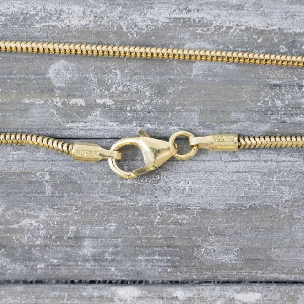 Goldkette als Schlangenkette in Gelbgold 585 / 14K, 55 cm lang, 1,4 mm breit, Gewicht ca. 5.3 g.