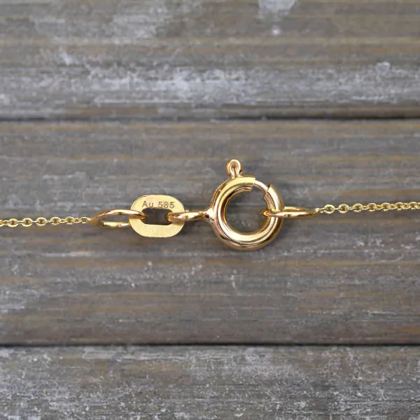 Goldkette als Ankerkette flach in Gelbgold 585 / 14K, 34 cm lang, 0,8 mm breit, Gewicht ca. 0.8 g.