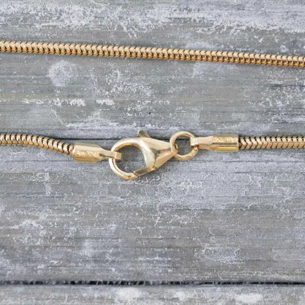 Goldkette als Schlangenkette in Gelbgold 750 / 18K, 42 cm lang, 1,4 mm breit, Gewicht ca. 4.4 g.