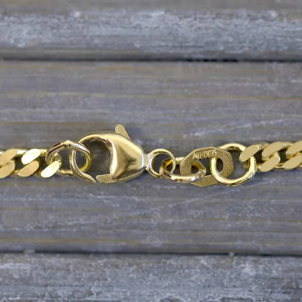 Goldkette als Panzerkette flach in Gelbgold 375 / 9K, 100 cm lang, 2,7 mm breit, Gewicht ca. 16.7 g.