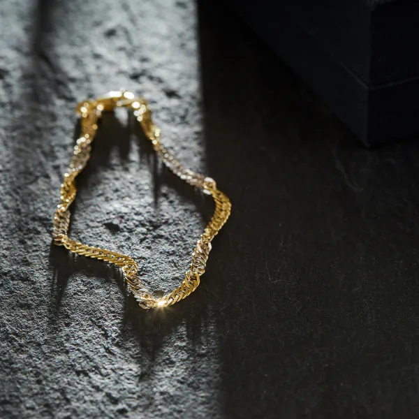 Armband als Singapurkette in Gelbgold 585 / 14 K, 18,5 cm lang, 2,9mm breit, Gewicht ca. 2.9 g.
