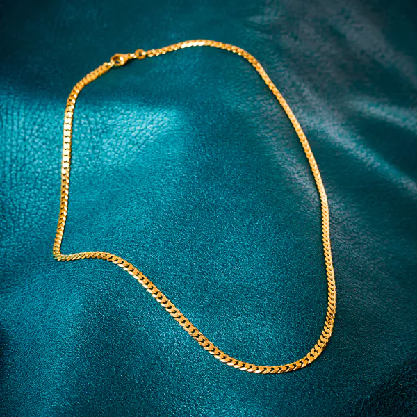 Goldkette als Panzerkette facettiert in Gelbgold 585 / 14 Karat, 65 cm lang, 3.9 mm breit, Gewicht ca. 18 g.