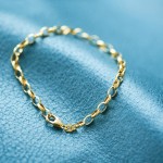 Armband als Erbskette hohl in Gelbgold 585 / 14K, 21 cm lang, 4,5 mm breit, Gewicht ca. 3,3 g.