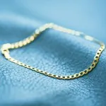 Armband als Panzerkette facettiert in Gelbgold 333 / 8 K, 18 cm lang, 5mm breit, Gewicht ca. 4.7 g.