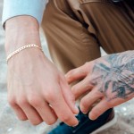 Armband als Panzerkette facettiert in Gelbgold 585 / 14 K, 18 cm lang, 5mm breit, Gewicht ca. 5.7 g.