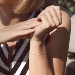 Goldarmband als Ankerkette mit 0,14 Karat Diamanten, Weißgold 585 / 14 Karat, 17 cm lang, Gewicht ca. 0.9 g.