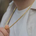 Goldkette als Zwillingspanzerkette in Gelbgold 375 / 9 Karat, 45 cm lang, 4.8 mm breit, Gewicht ca. 6.6 g.