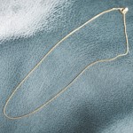 Goldkette als Panzerkette flach in Gelbgold 375 / 9K, 50 cm lang, 1,1 mm breit, Gewicht ca. 1.7 g.