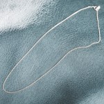 Goldkette als Panzerkette flach in Weißgold 585 / 14K, 50 cm lang, 1,1 mm breit, Gewicht ca. 2.1 g.