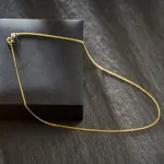 Goldkette als Panzerkette flach in Gelbgold 585 / 14K, 80 cm lang, 1,6 mm breit, Gewicht ca. 6.6 g.