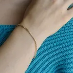 Armband als Kordelkette hohl Leichtversion in Gelbgold 750 / 18K, 18 cm lang, 2,1 mm breit, Gewicht ca. 1.5 g.