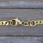 Armband als Panzerkette flach in Gelbgold 333 / 8K, 18.5 cm lang, 2,7 mm breit, Gewicht ca. 3.2 g.