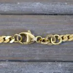 Goldkette als Panzerkette flach in Gelbgold 333 / 8K, 90 cm lang, 2,7 mm breit, Gewicht ca. 14.6 g.